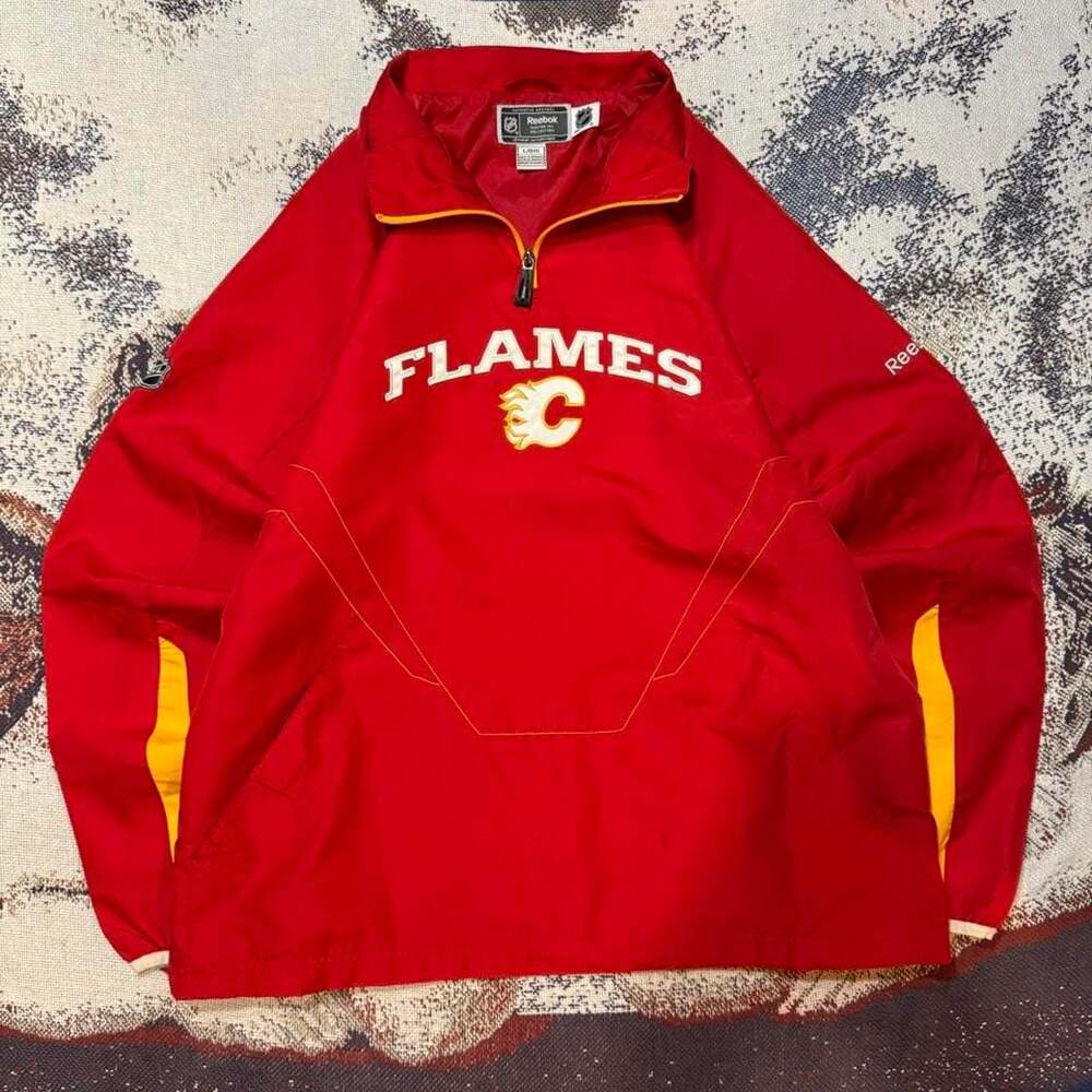 Reebok Calgary Flames NHL Center Ice Collection Quarter Zip Windbreaker